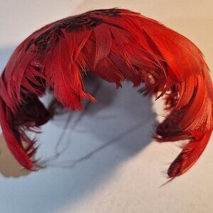 Vibrant red vintage feather fascinator women's hat.
